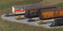 Price: $23.70 Deep-Well N 4-Flatcar Set w/trailers & Containers Trix.