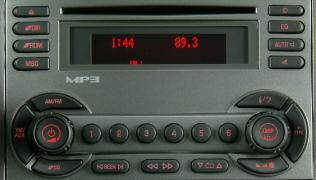 8 Getting to Know Your Torrent Multiple-Disc CD Changer (if equipped) The six-disc CD changer can hold up to six CDs. To load one CD or multiple CDs, follow the steps below. Load One CD 1.