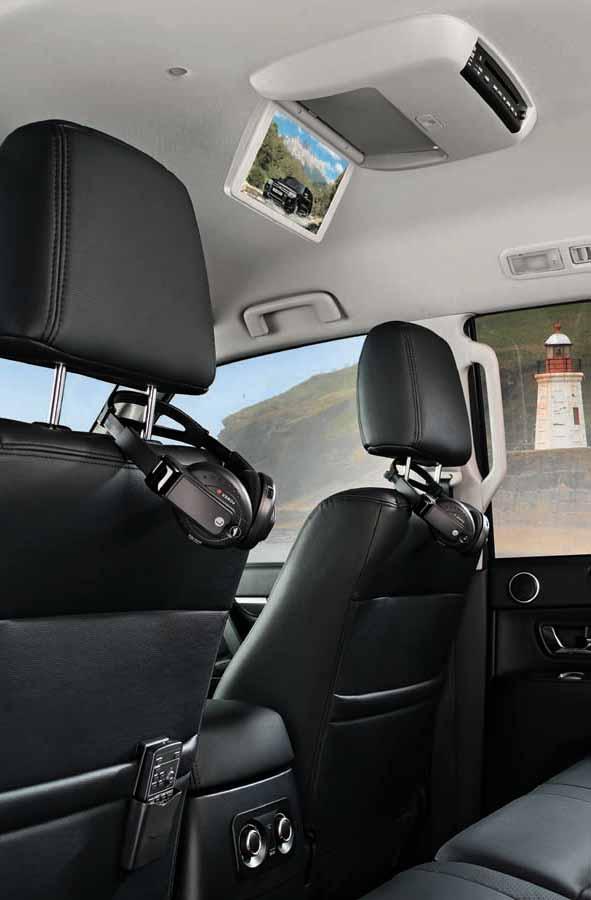 Rear seat entertainment system sunroof. player, MP3 & WMA compatible, remote control and remote control holder included.