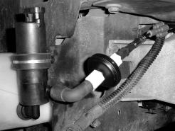 (5) Remove all debris from the reservoir. Fig. 18 Intercooler Sprayer Tubing Assembly Fig.