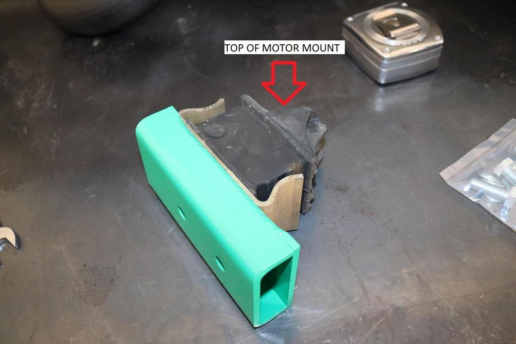 33) Install motor mount / lift block assembly into vehicle. Install one side at a time.