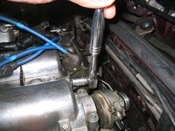 This can be done by removing the drain plug on the bottom of your radiator and removing the radiator cap.