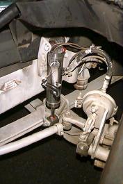 Figures 4.4 and 4.5, respectively. front driver passenger Figure 4.4. MR Dampers Installed on the Front Axle rear driver passenger Figure 4.