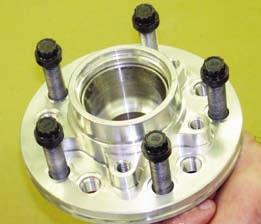 Assembly Instructions (Continued) Pack the small outer bearing cone (15) with high temperature disc brake bearing grease and install into hub (10). Slide the hub assembly onto the spindle.