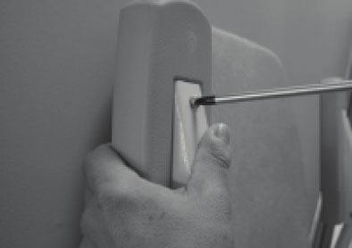 Step 11: The armrest control is factory set for right-hand operation.