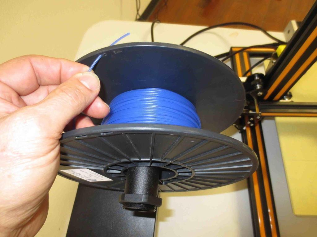 f. When the printer is fully heated, you may want to remove all of the filament color left in the printer from previous prints before you start a new print.