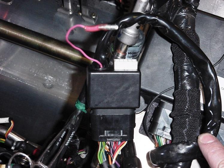 Then reconnect the stock connector into the open end of the Boondocker Plug and Play harness. (See picture) B.
