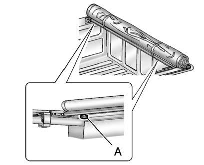 Do this on both sides. Both latches must remain engaged and the wing bolts tightened while the cover is on the vehicle.