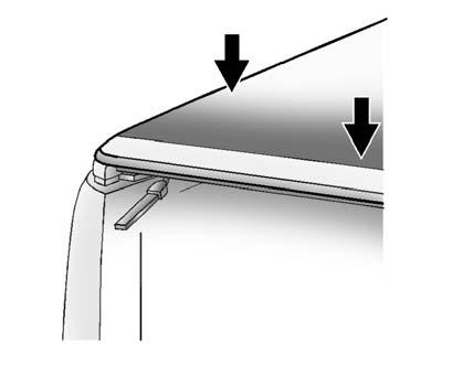 Firmly press down on each side of the cover, until the latches are secured into the side rails. If latch is too tight, loosen the tension adjustment screws.