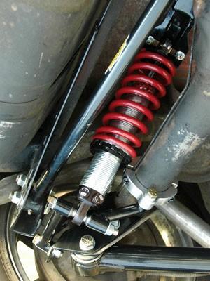 26. Once the coilover system is installed you still have to torque the lower control arm bolts to the rear end housing.