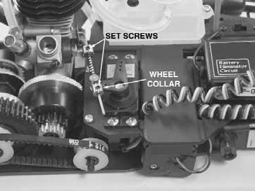 Place the metal wheel collar and the throttle linkage spring onto the throttle rod (Do not tighten the wheel collar yet). Install the throttle servo horn onto the throttle servo as shown. 14.