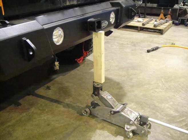 11. When mounting the bumper up for fitment it may help if you use a floor jack to hold up on