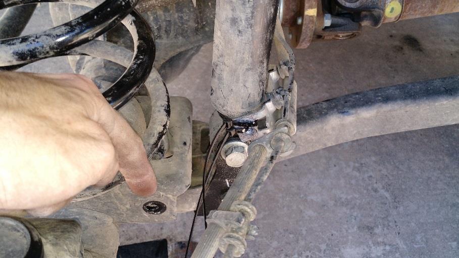 Note: you may remove this bracket from the brake line, but proceed with extreme caution. One wrong move and you ll be buying a new brake line. 14.