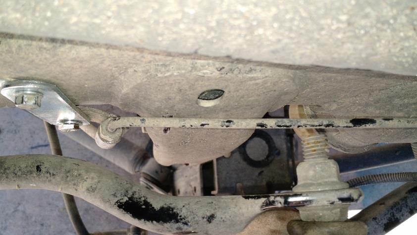 Install the Brake line bracket using a 10mm socket with the original hardware and 11mm socket/wrench on both sides