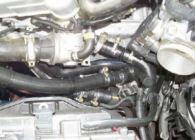 inlet B A C.6 liter gasoline A Ensure sufficient distance to neighboring components. Route hose A under original vehicle lines.