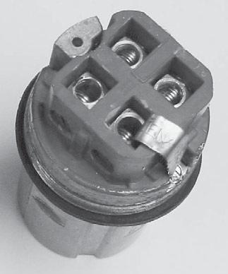 Style 2 Metallic A Style 2 metallic housing plug is one in which the grounding conductor in the flexible cable is bonded to the extra (grounding) pole and metal plug sleeve by a pressure connector.