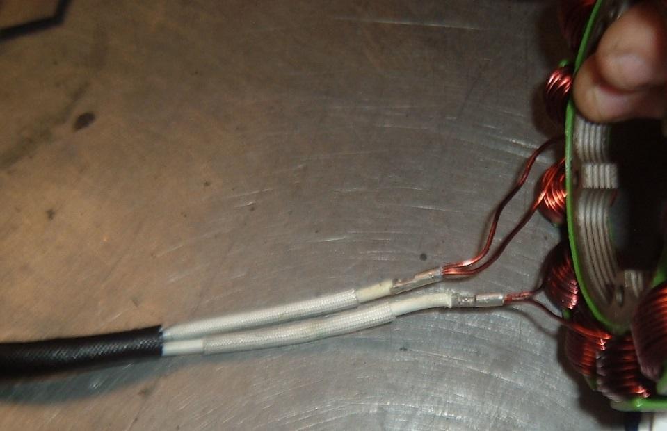 6. Unsolder coil wires from both terminals, as shown in Figure 3.
