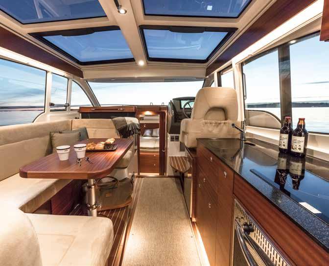 AN INTERIOR CHARACTERISED BY SCANDINAVIAN DESIGN The interior of the 365 offers genuine quality with beautiful dark mahogany creating a delightful contrast to the light varnished surfaces and a