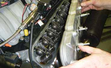 1. Remove the engine covers, coil packs, fuel lines (if necessary to get to the valve covers), and anything else necessary to remove the valve covers from the vehicle.