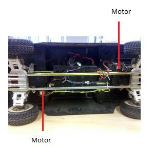 Initial Research: In October 2010, we disassembled the toy hummer and found that there were two DC motors, one for the front axle and one for the rear axle as shown in figure 2.