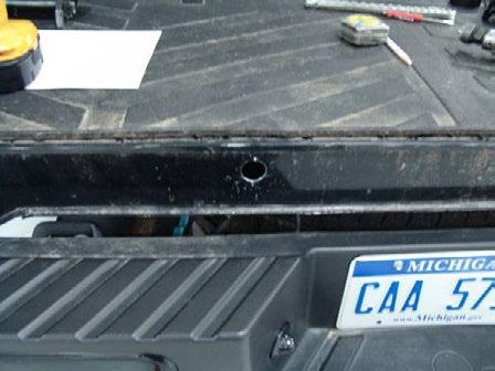 Prepare a clean, flat work surface for tailgate.