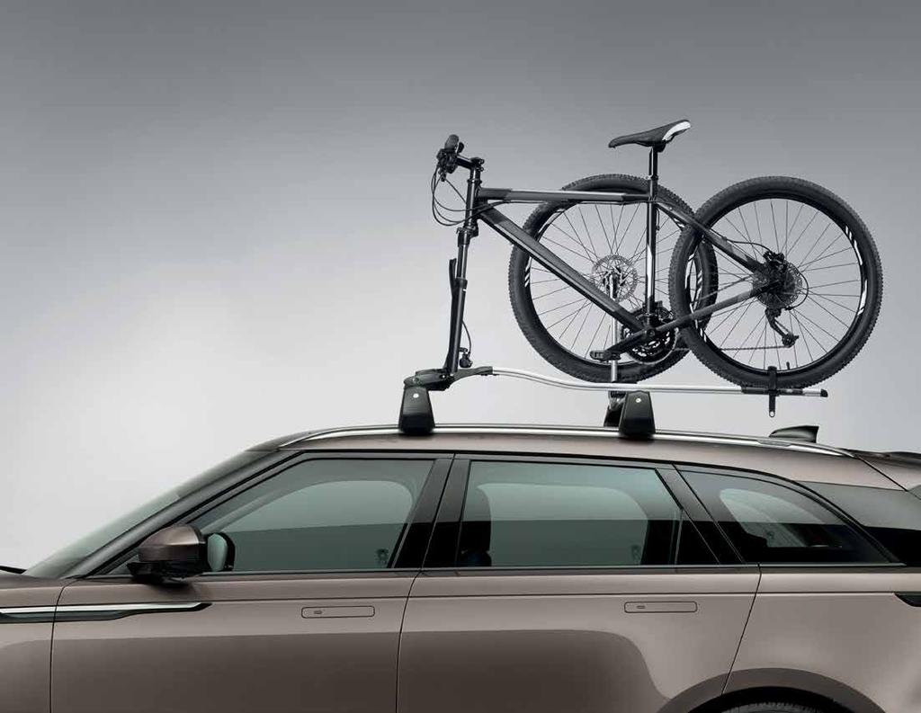 ROOF-MOUNTED BIKE CARRIER - FORK-MOUNTED AND WHEEL CARRIER * Roof-mounted cycle carrier provides a simple and secure fitting with the bicycle front wheel removed, ideally suited to lightweight bikes