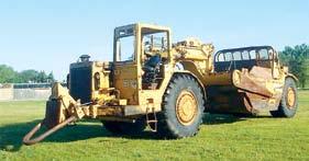 In fair condition with poor to fair tires. (9) CAT 631D Motor Scrapers, Cat 3408 dsl engine and ps trans, cushion hitch, ROPS canopy and 37.25x35 tires.