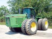DEERE 8760 dual rear wheels, 6.00-185R front and 18.4-42 rear tires.