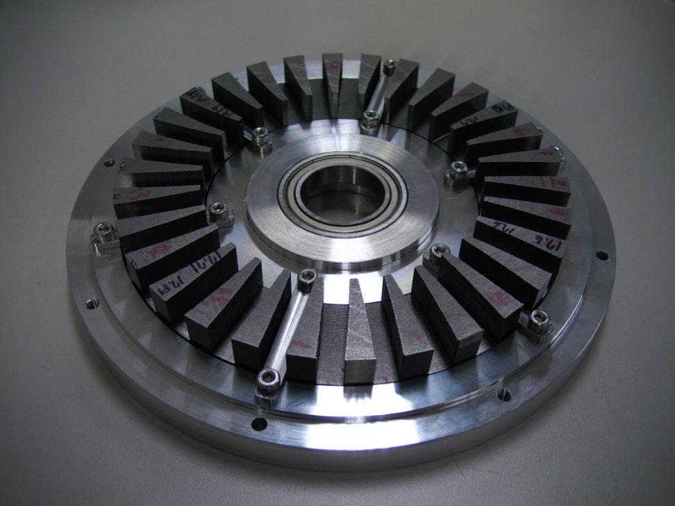 2 [6] Tables Table 1: specification of the axial flux machine Property Rotor diameter, mm Stack length, mm Air gap, mm Dimensions Rotor/Magnet thickness, mm Stator thickness, mm Slot width, mm Slot