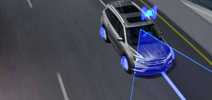 PAYS ATTENTION TO HELP KEEP YOU ON TRACK LANE DEPARTURE WARNING By reading the markings on the road beneath you, this technology triggers an on-screen message and sounds an audible alert if you