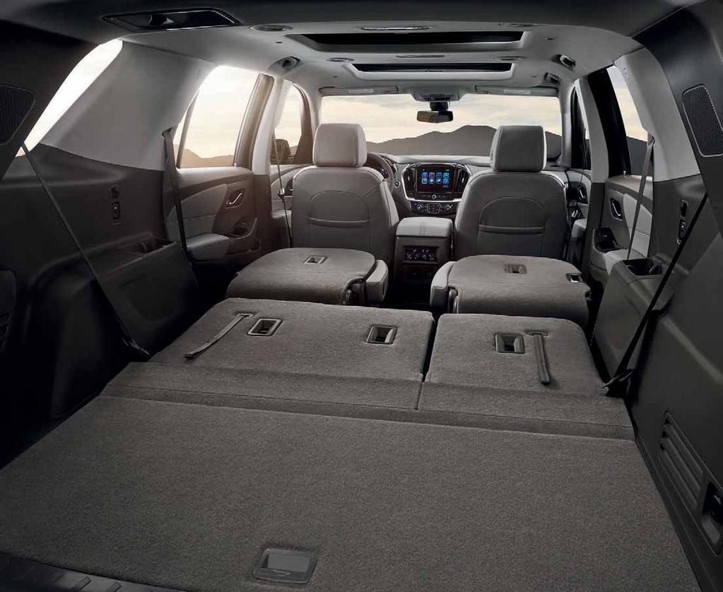 Traverse Premier Medium Ash Gray perforated leather-appointed seating with Dark Atmosphere accents. AS BIG AS YOUR IMAGINATION.