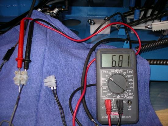 v DC. 2. Measure voltage at test harness port labeled POT Sense or Sense and Ground of Test Board: a.