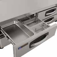 . Drawers are supported on stainless steel telescoping slides with