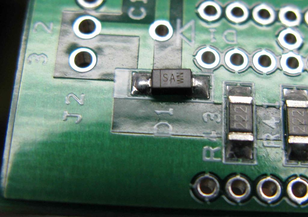 o Turn the board over, re-tape to the cookie sheet, and solder the even numbered resistors as before. When you are finished with this side, the resistance between pin 1 and 3 should be 50 ohms.