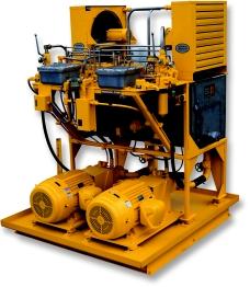Hydraulic power unit incorporating twin 75 hp explosion proof electric motors,each powering its own 68 gpm variable displacement pump with common 210 gallon reservoir 50 hp electric motor; explosion