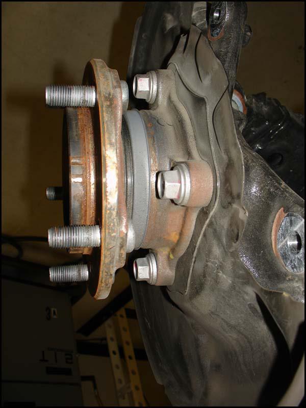 2WD Models: Remove the front hub sub-assembly.