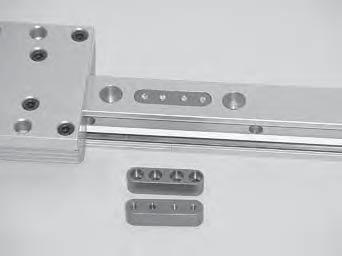 For optimal cassette rolling performance, all holes in the guide rails should be filled with the plastic rail mounting screw covers.