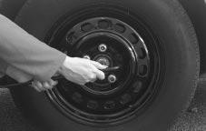 Removing the Flat Tire and Installing the Spare Tire If needed, you can finish loosening them with your fingers.