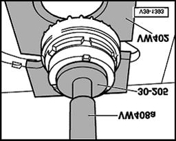 - Install small bevel gears, drive in shaft and secure with spring pin.