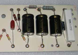 Remember that electrolytic capacitors (22uf/450v