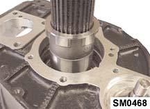 Install the output shaft bearing in the housing using a soft faced mallet and a suitable
