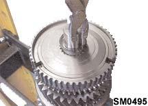Refer section Tools Information Procedure - 1. Support the mainshaft.