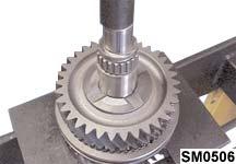 Remove 2nd speed gear, synchroniser flange and synchroniser