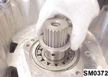 Remove the reverse idler gear, bearings and the two thrust washers from the case.