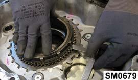 Place the synchroniser ring over the synchroniser flange.