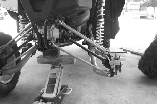 5. Once you have preassemble the radius bars, jack up the rear