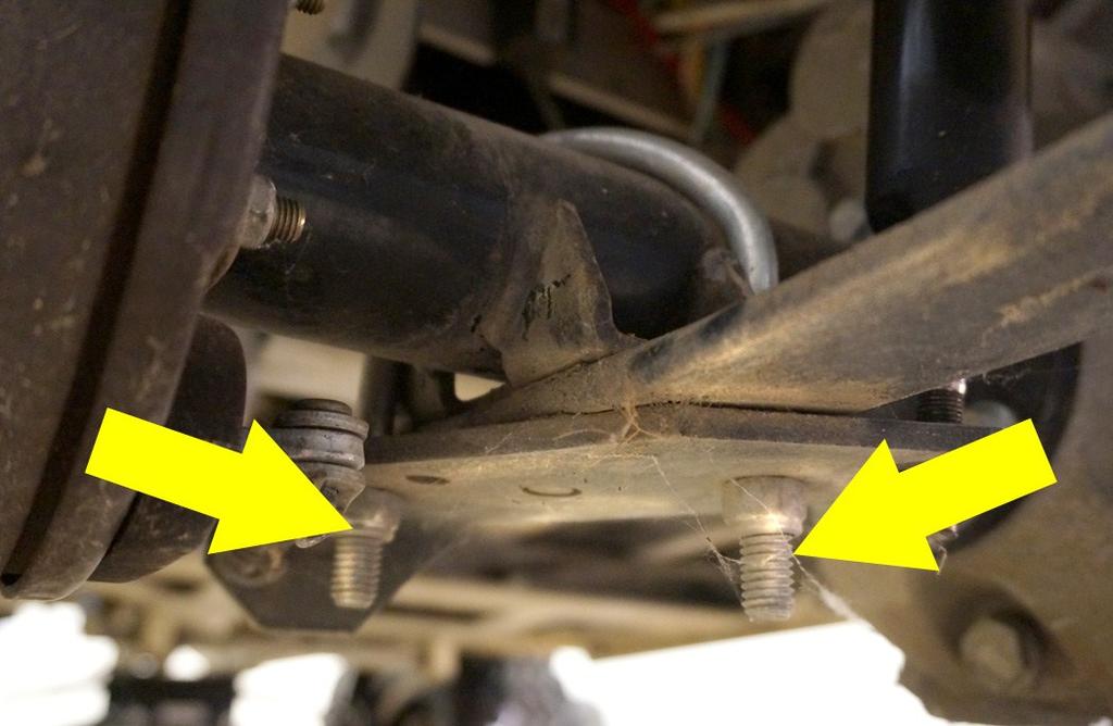 Remove any jack stands and lower the cart safely to the ground. Remove the chocks behind the rear wheels.