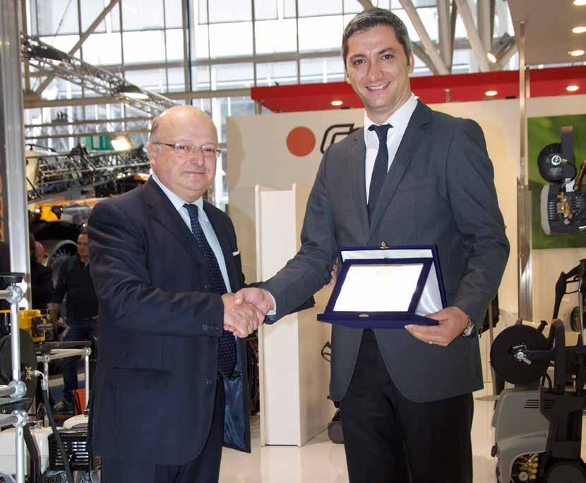 Comet Trade Fair Report 05 Comet and Toyman, 10 years of outstanding cooperation During EIMA 2014, Mr Paul Bucchi - President and CEO of Comet Spa - and Mr.
