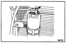 DISCHARGE REFRIGERANT IN REFRIGERATION SYSTEM INSTALLATION HINT: Evacuate air from refrigeration system. Charge system with refrigerant and inspect for leakage of refrigerant.