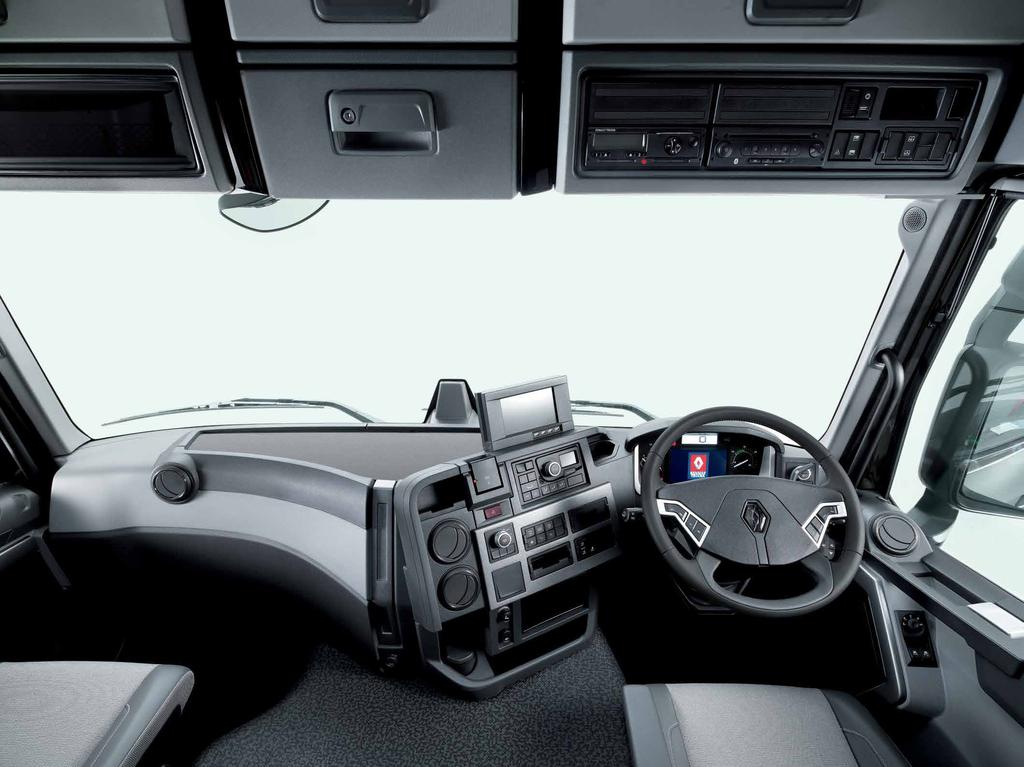 renault trucks_ 22 23 renault trucks_ EVERYTHING WITHIN REACH The wrap-around dashboard brings controls within easy reach. Automatic equipment lets the driver concentrate on their driving.